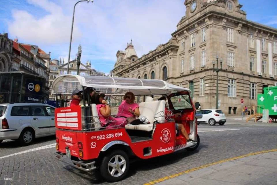 Porto tour by tuk-tuk and port wine cellar guided tour with tastings