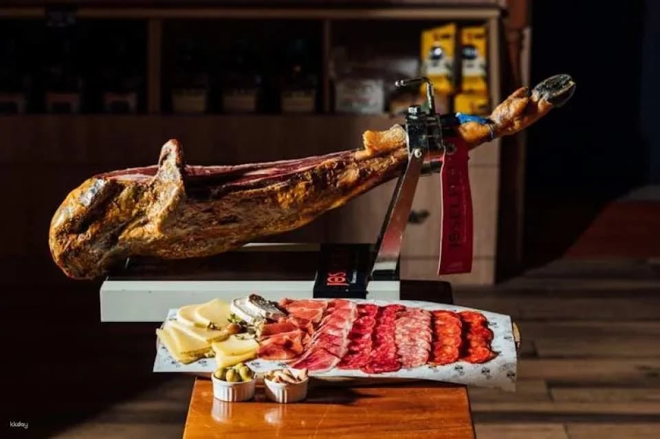 Barcelona district tour with traditional tapas tasting