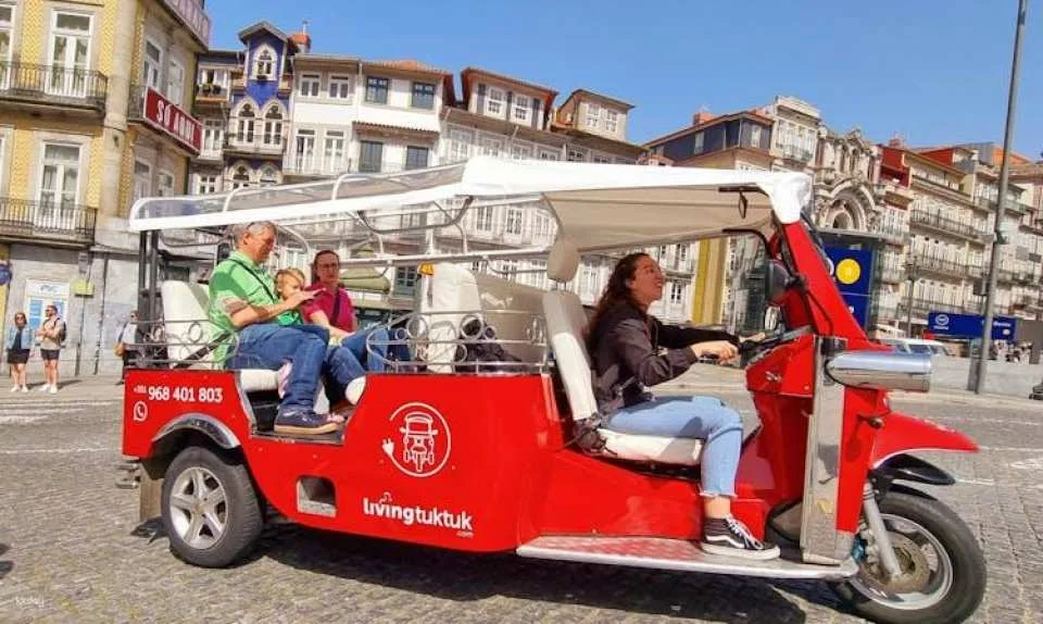 Porto sightseeing by tuk-tuk and six bridges cruise on the Douro River