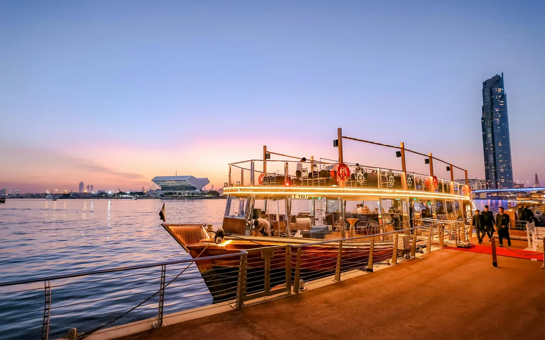 Luxury Dubai Canal Dinner Cruise with La Perle Show Gold Pass Image 1