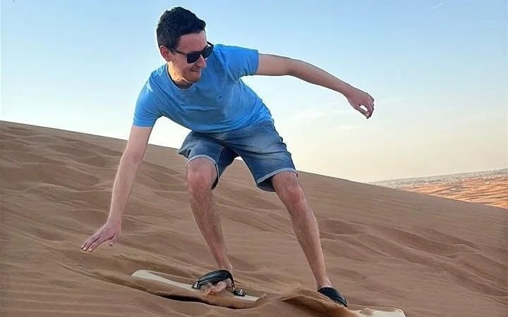 Morning Desert Safari with Dune Bashing, Sandboarding & Camel Ride Image 2