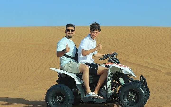 Morning Desert Safari with Dune Bashing, Sandboarding & Camel Ride Image 5
