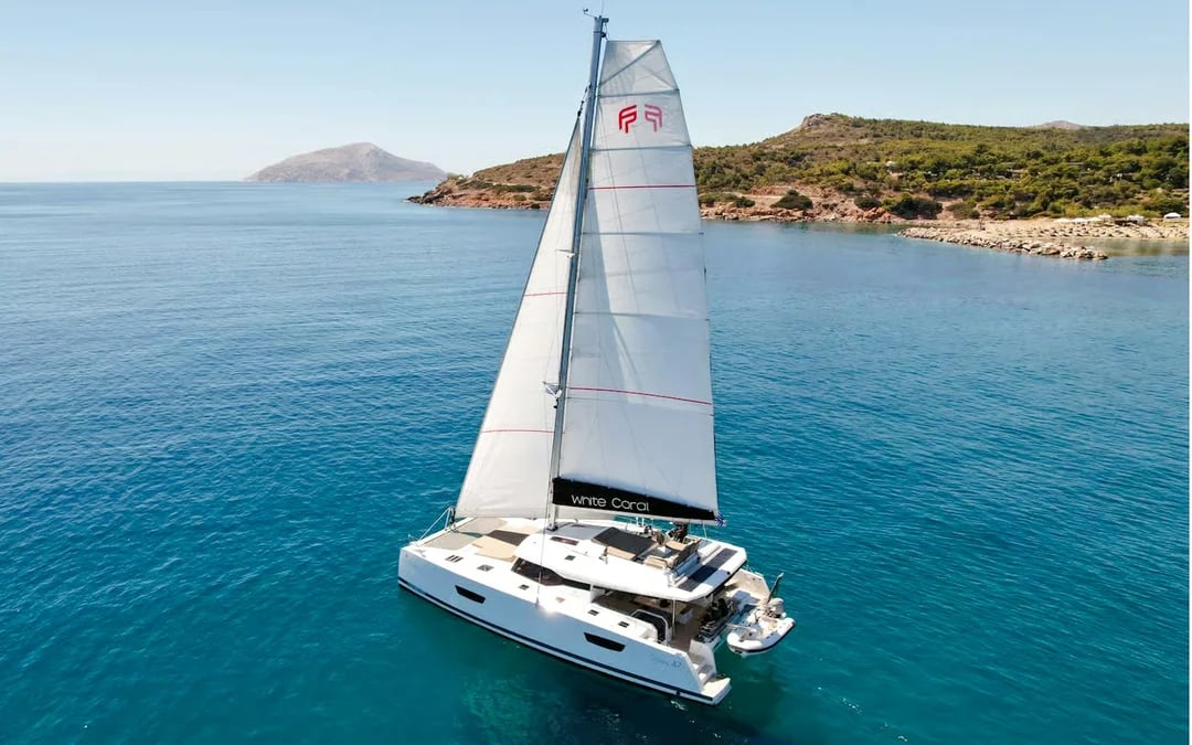 Mykonos: Catamaran Cruise to Rhenia with Meal, Drinks and Hotel Transfers Image 1