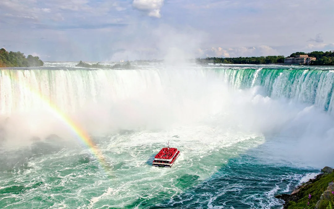 Niagara Falls Canada: Guided Tour with Hornblower Cruise, Journey Behind the Falls & Skylon Tower
Image 1