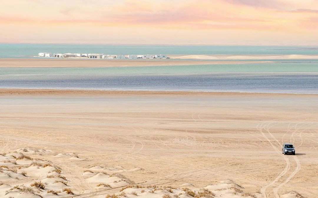 Premium Doha Desert Safari with Dune Bashing, Sandboarding, Camel Ride, Quad Biking & Inland Sea Image 4