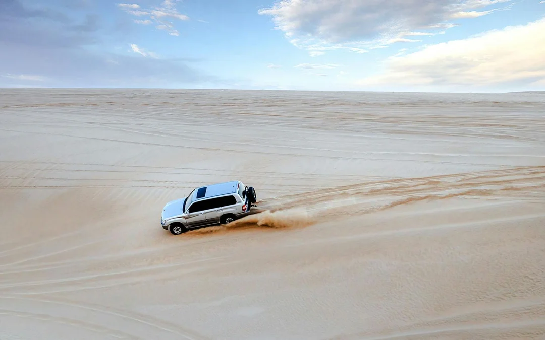 Premium Doha Desert Safari with Dune Bashing, Sandboarding, Camel Ride, Quad Biking & Inland Sea Image 5