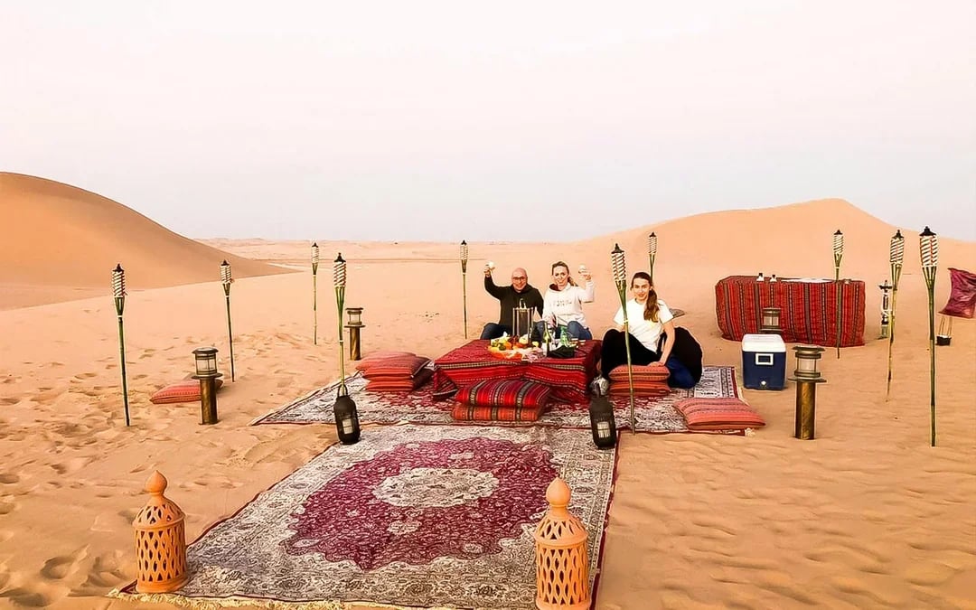 Private Al Khatim Desert BBQ Dinner with Dune Bashing & Hotel Transfers Image 1