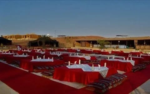 Ras Al Khaimah Desert Safari with Dune Bashing, Camel Ride, Sand Boarding, BBQ Dinner, and Transfers Image 3