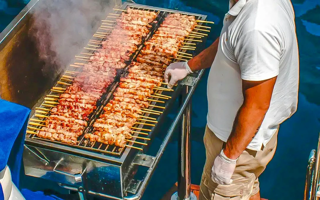 Santorini Catamaran Cruise with Greek BBQ & Drinks Image 5