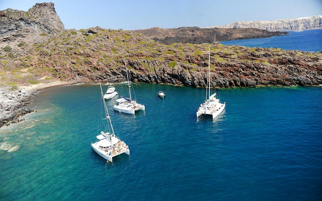 Santorini Private Sailing Catamaran Cruise with BBQ, Drinks & Transfers
 Image 2