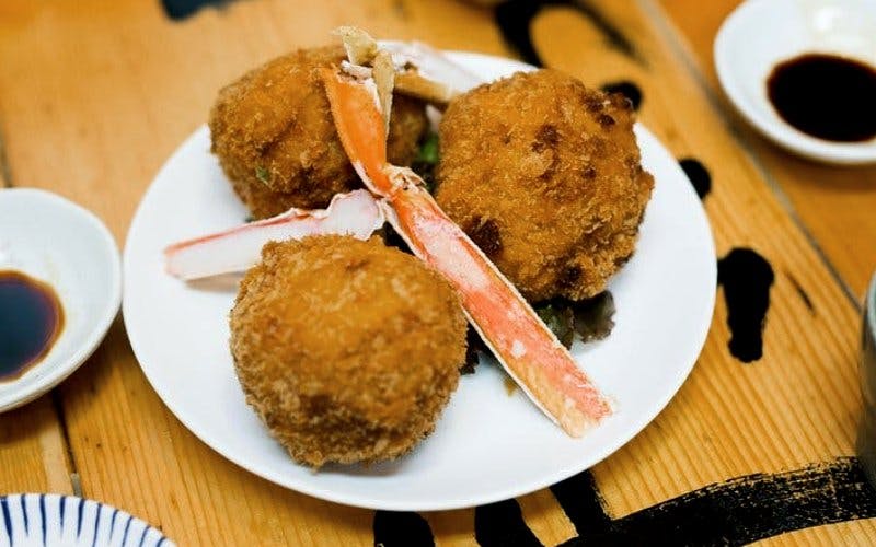 Shinjuku Izakaya Food Walking Tour with 14 Tastings and Drinks Image 4