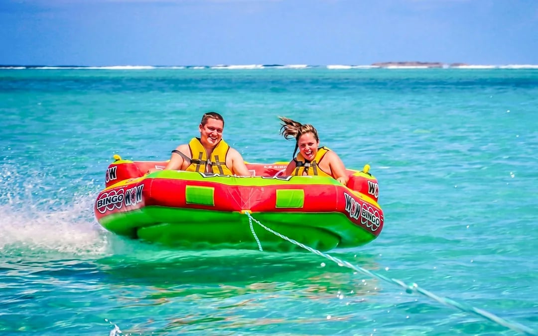 Speedboat trip to Ile aux Cerfs with Parasailing, Tube Riding & Lunch Image 1
