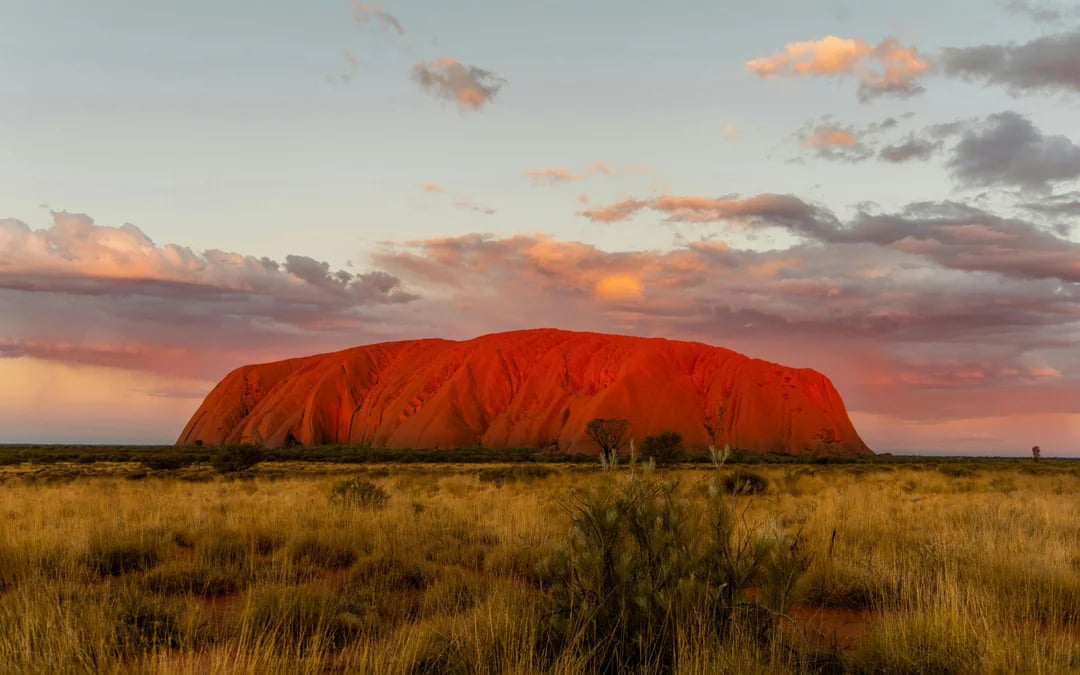 Sunset at Uluru: Sacred Sites Tour with Rock Art, Sparkling Wine, Cheeseboard and Hotel Transfers Image 1