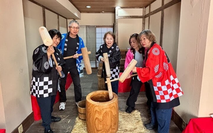 Traditional Mochi Pounding Hands-On Experience with Rice Cake Tasting and Traditional Costume Image 3