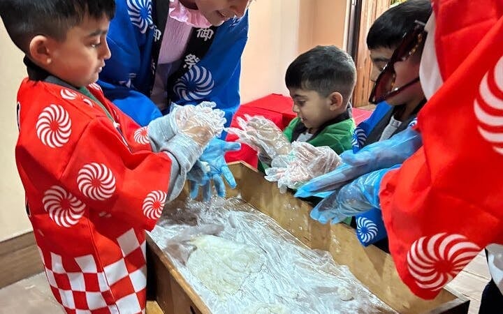 Traditional Mochi Pounding Hands-On Experience with Rice Cake Tasting and Traditional Costume Image 6