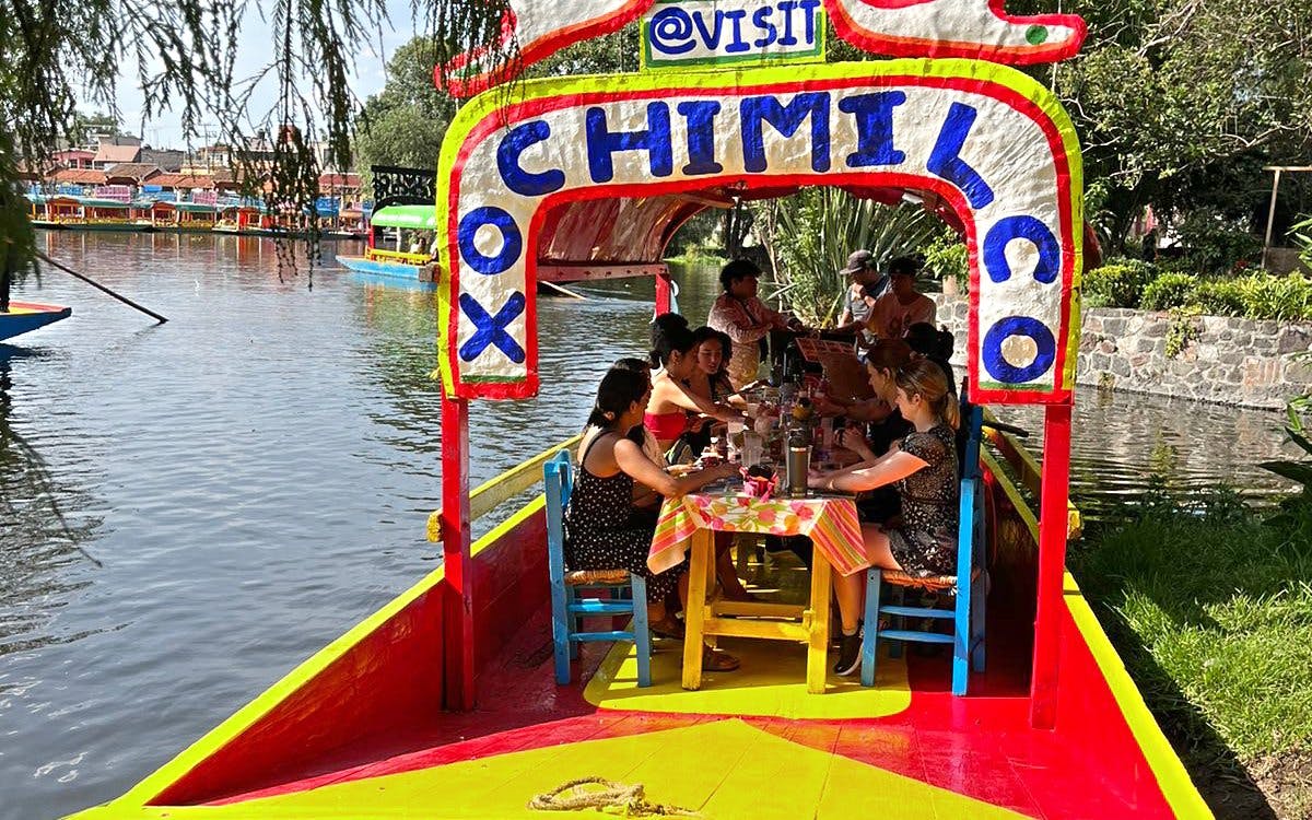 Xochimilco Boat Tour with Mexican Tacos, Unlimited Drinks & Games Image 1